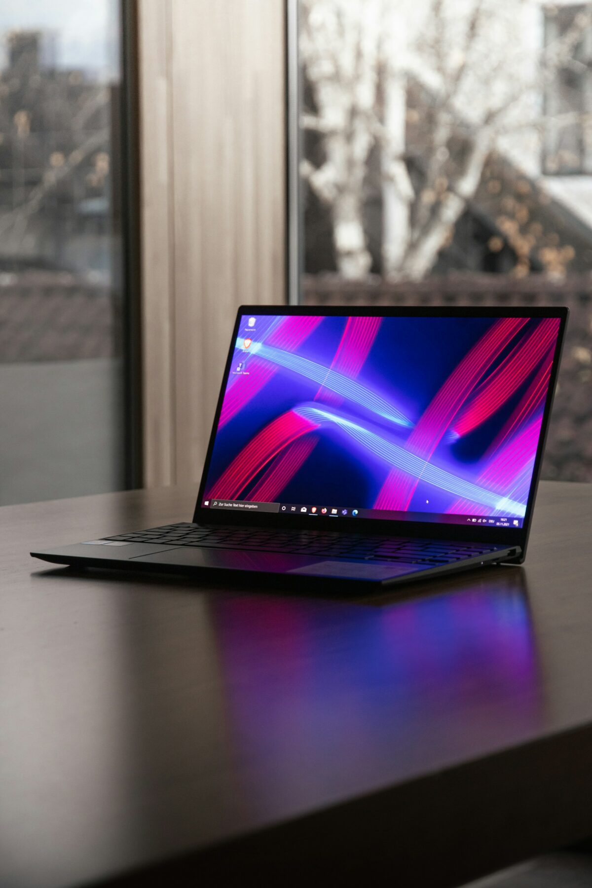How can I partition Windows 10 on a new laptop?
